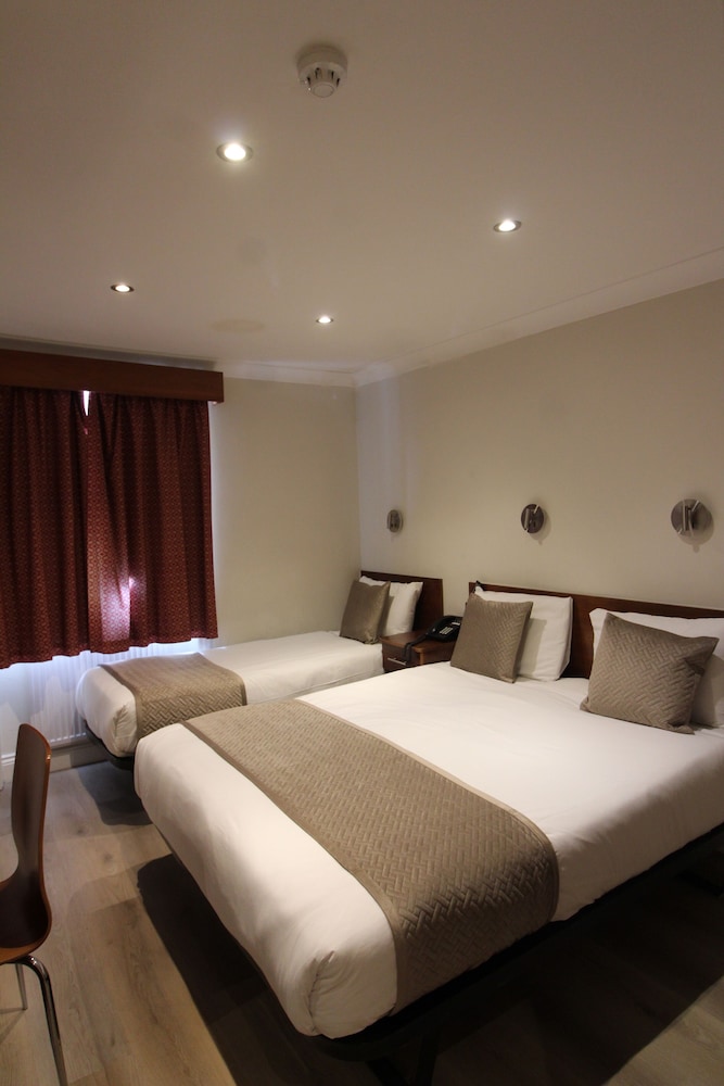 Habitación triple del hotel Wedgewood. Foto 2