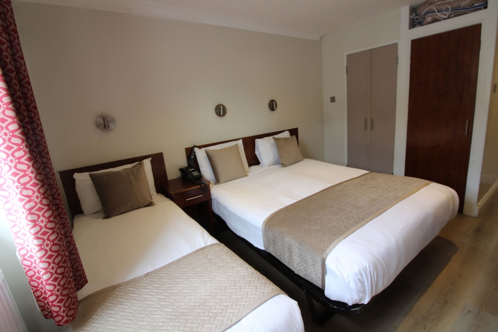 Habitación triple del hotel Wedgewood. Foto 3