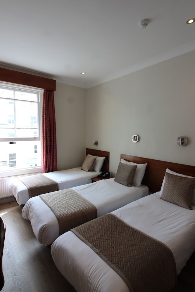 Habitación triple del hotel Wedgewood. Foto 4