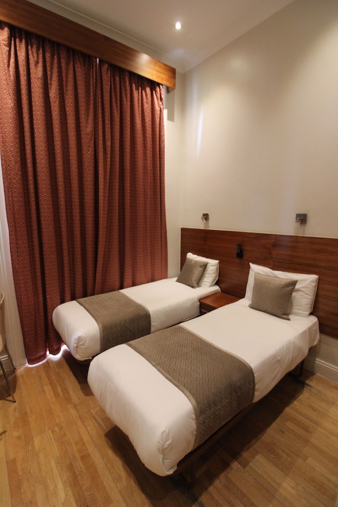 Habitación triple del hotel Wedgewood. Foto 6