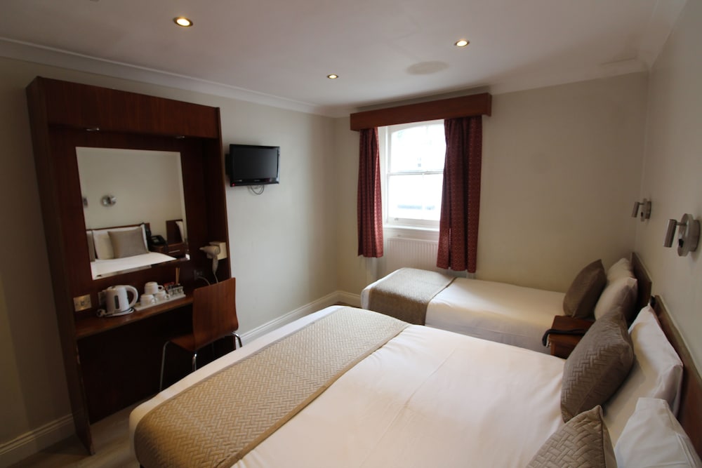 Habitación cuádruple del hotel Wedgewood. Foto 2