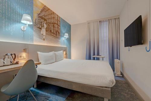 Habitación con cama grande del hotel Manchester Portland By Sunday