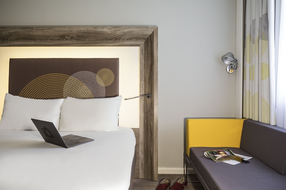 Habitación Ejecutiva con 1 cama Queen y Sofá convertible del hotel Novotel Newcastle Airport. Foto 3