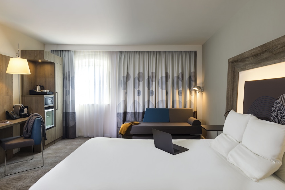 Habitación Ejecutiva con 1 cama Queen y Sofá convertible del hotel Novotel Newcastle Airport. Foto 4