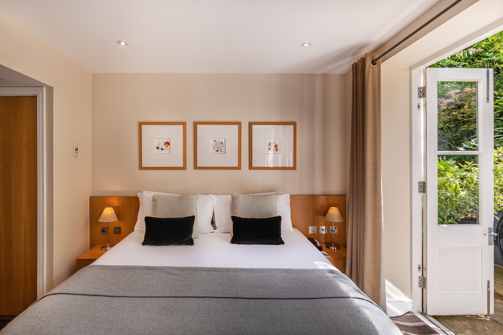 Habitación superior del hotel The Resident Kensington. Foto 1