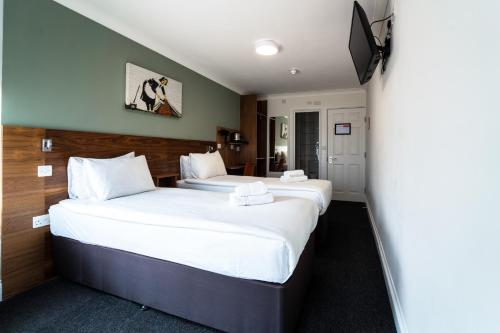 Habitación Doble Premium - 2 camas del hotel Chelsea Guest House. Foto 2