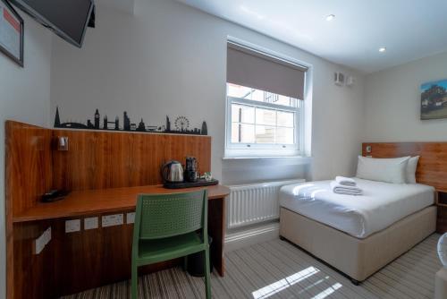 Habitación Triple Premium del hotel Chelsea Guest House. Foto 14