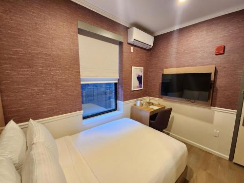 Habitación Boutique Estándar del hotel Mayfair New York Times Square. Foto 3