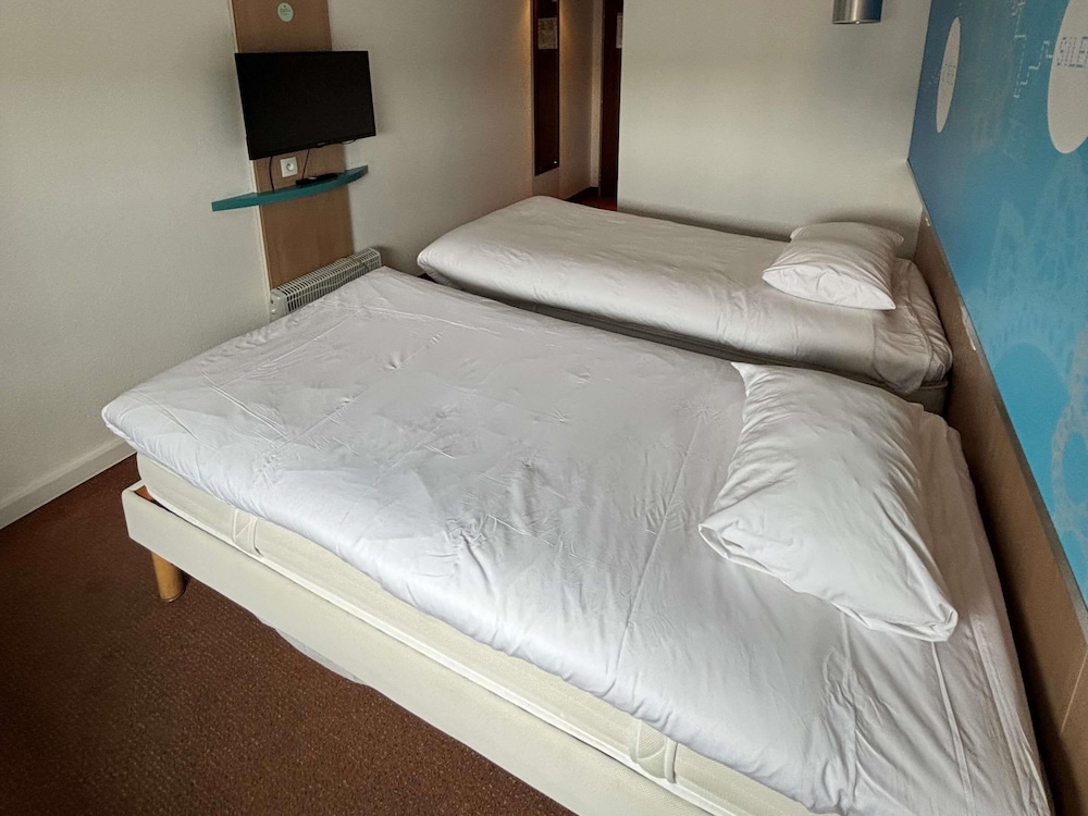 Habitación Standard con dos camas individuales del hotel Ibis Styles Bethune Bruay. Foto 8