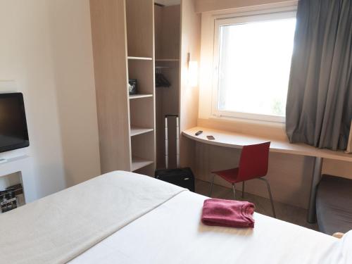 Habitación Doble Estándar del hotel Ibis Pilar. Foto 3