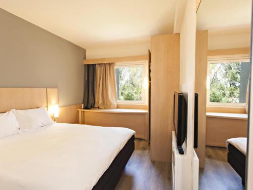 Habitación Doble Estándar del hotel Ibis Pilar. Foto 6