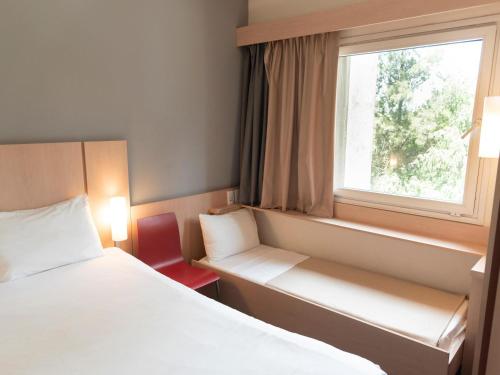 Habitación Estandar del hotel Ibis Pilar. Foto 1