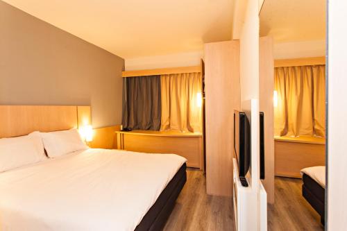 Habitación Estandar del hotel Ibis Pilar. Foto 7