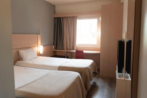 Habitación Doble Estándar - 2 camas del hotel Ibis Pilar. Foto 4