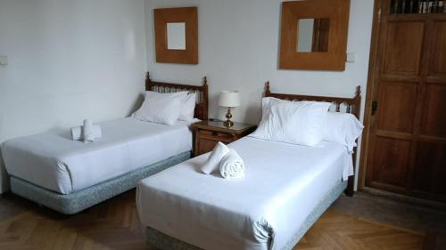 Habitación Doble - 2 camas del hotel Hospedería Santa Cruz. Foto 4