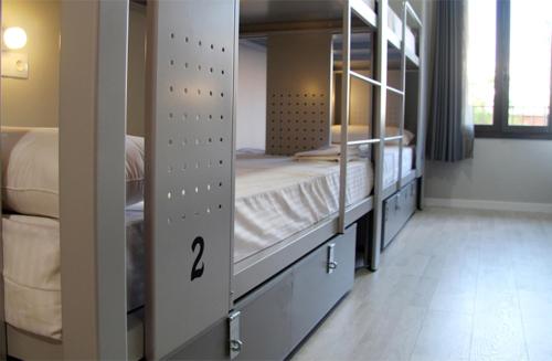 Habitación privada - 4 camas del hotel Bcnsporthostels. Foto 8