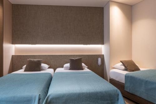 Habitación Triple del hotel Central Paris. Foto 3