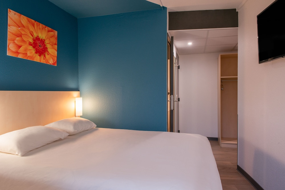 GEMELA - Habitación con camas gemelas del hotel Ibis Budget Cannes Centre Ville. Foto 1