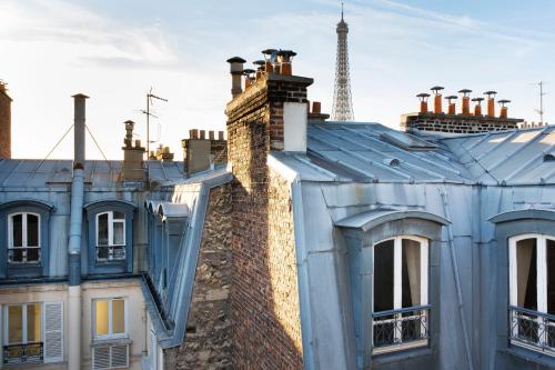 Habitación Doble con vistas a la torre Eiffel del hotel CLER. Foto 9