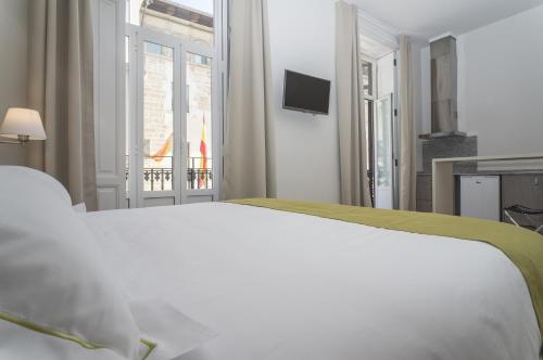 Estudio Deluxe con cama grande del hotel San Lorenzo Boutique. Foto 6