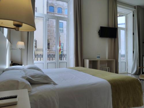 Estudio Deluxe con cama grande del hotel San Lorenzo Boutique. Foto 8