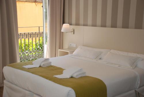 Habitación Cuádruple Prémium del hotel San Lorenzo Boutique. Foto 4