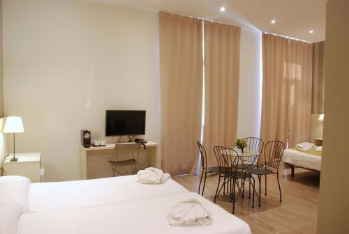 Habitación Cuádruple Prémium del hotel San Lorenzo Boutique. Foto 10