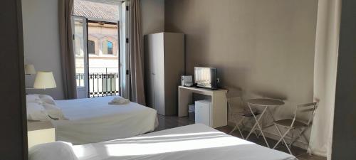 Habitación Familiar Deluxe del hotel San Lorenzo Boutique. Foto 3