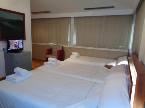Habitación Triple del hotel Villa De Betanzos. Foto 7