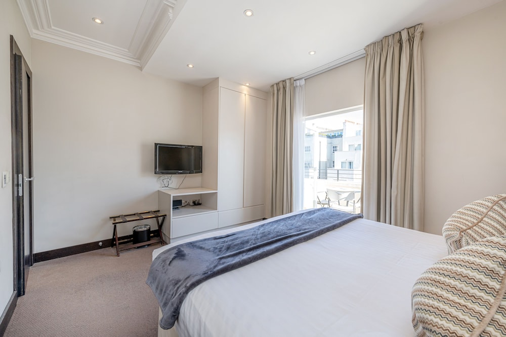 One Bedroom Deluxe with Balcony del hotel 130 Queen's Gate Apartments. Foto 3