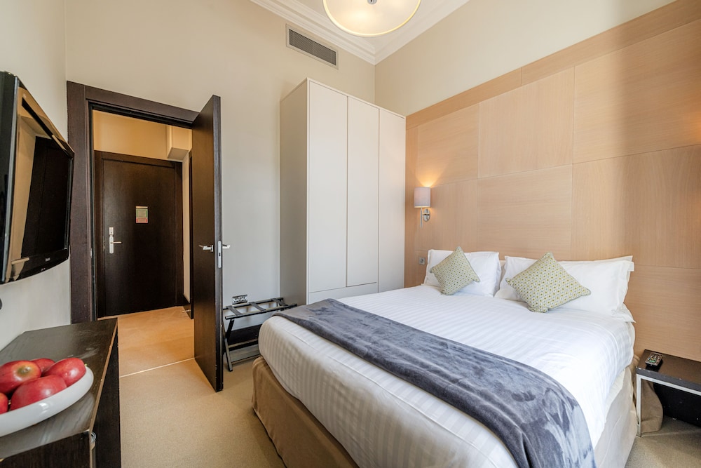 One Bedroom Deluxe with Balcony del hotel 130 Queen's Gate Apartments. Foto 5