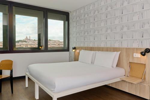 Habitación Deluxe con cama extragrande del hotel Generator Paris. Foto 4