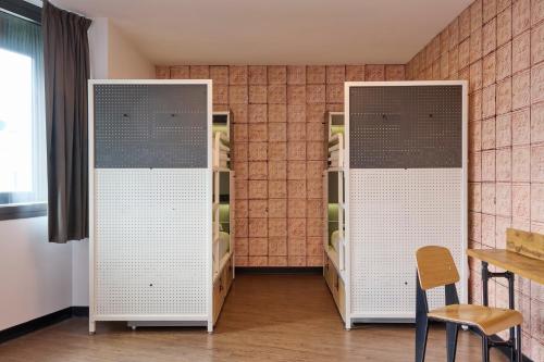 Cama en habitación compartida femenina de 8 camas del hotel Generator Paris. Foto 5