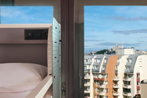 Cama en habitación compartida de 4 camas del hotel Generator Paris. Foto 6