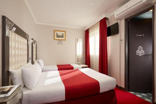 Habitación Triple del hotel Grand Amelot