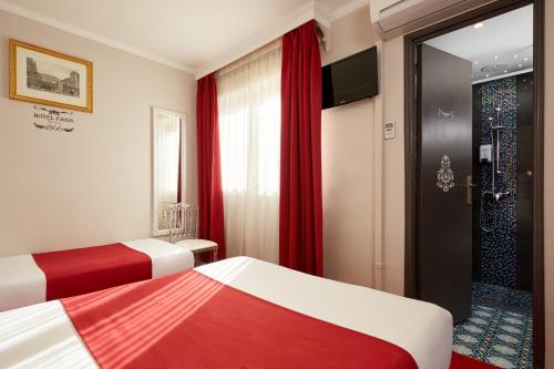 Habitación Triple del hotel Grand Amelot. Foto 1
