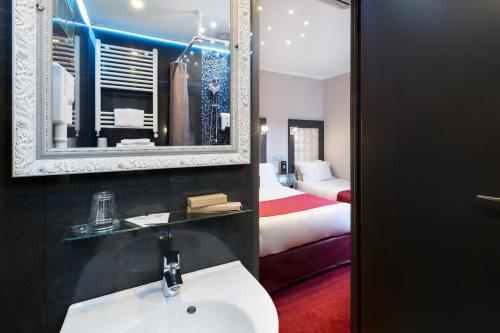 Habitación Triple del hotel Grand Amelot. Foto 9