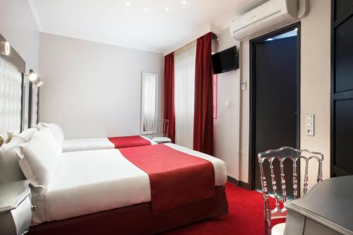 Habitación Triple del hotel Grand Amelot. Foto 11
