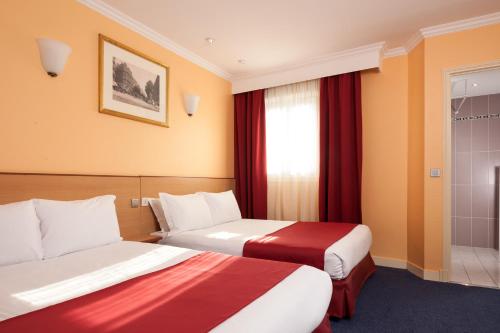 Habitación cuádruple del hotel Grand Amelot. Foto 6