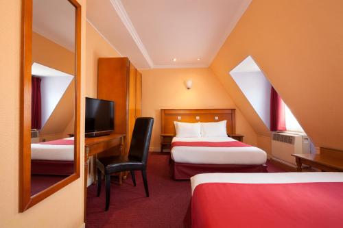 Habitación cuádruple del hotel Grand Amelot. Foto 9