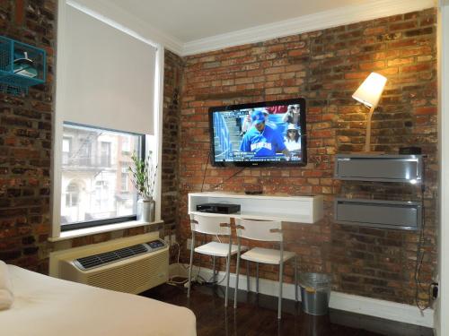 Estudio con 1 cama grande del hotel East Village. Foto 1