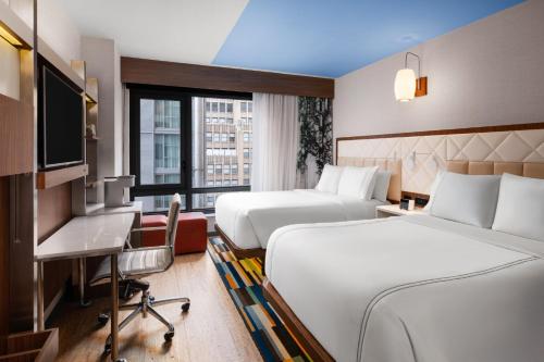 Habitación Doble con 2 camas dobles - No fumadores del hotel EVEN Hotel Times Square South. Foto 2