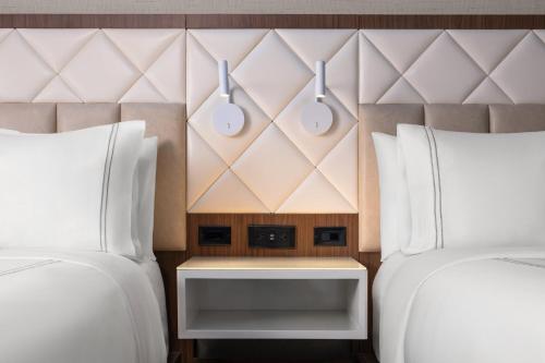 Habitación Doble Premium - 2 camas dobles - Planta superior del hotel EVEN Hotel Times Square South. Foto 4