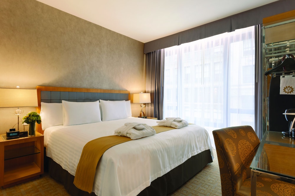 Habitación Executive con cama grande del hotel Executive Hotel Le Soleil New York. Foto 13