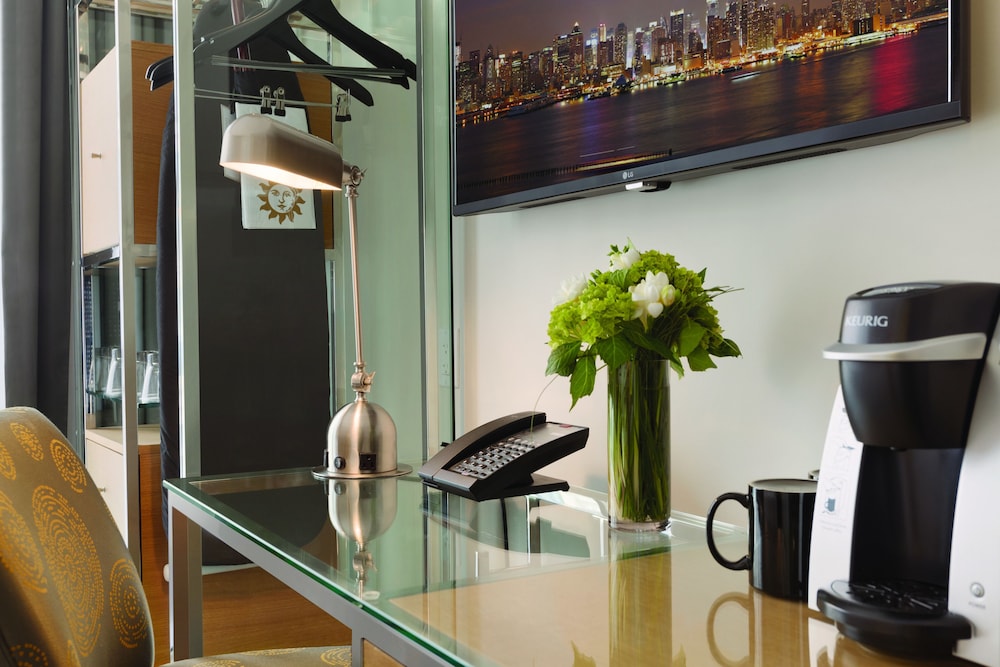 Habitación Executive con cama grande del hotel Executive Hotel Le Soleil New York. Foto 22