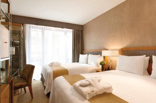 Habitación Ejecutiva con dos camas dobles del hotel Executive Hotel Le Soleil New York