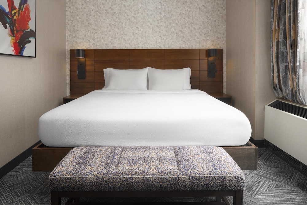 1 cama king size vista ciudad del hotel Hilton Garden Inn New York/Midtown Park Ave. Foto 8