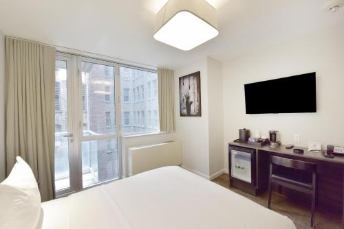 Habitación Superior con cama grande del hotel 32 32. Foto 1