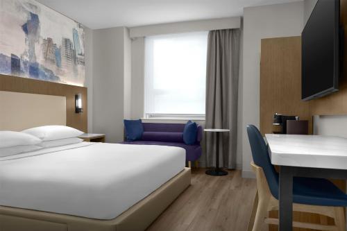 Habitación con cama extragrande - Planta superior del hotel Hyatt Herald Square New York. Foto 9