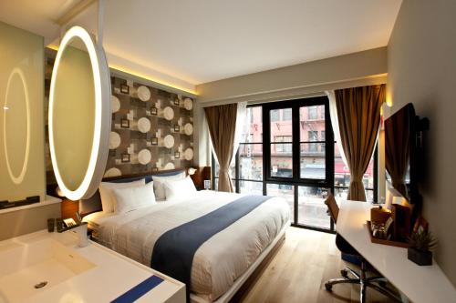 Habitación Estándar - Cama extragrande del hotel NobleDEN. Foto 3